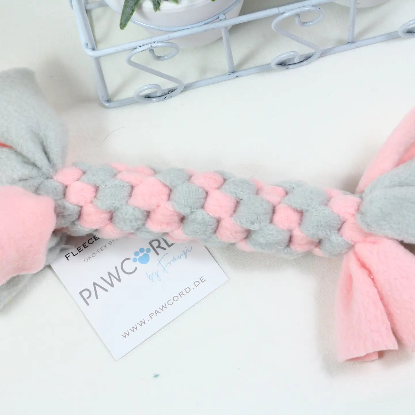 Fleece-Zergel in Babyrosa und Hellgrau